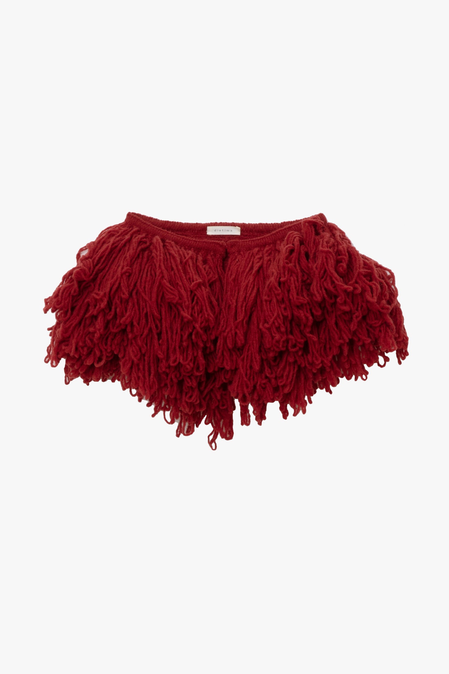 Image of an oversized wool red fringe collar on a white background.