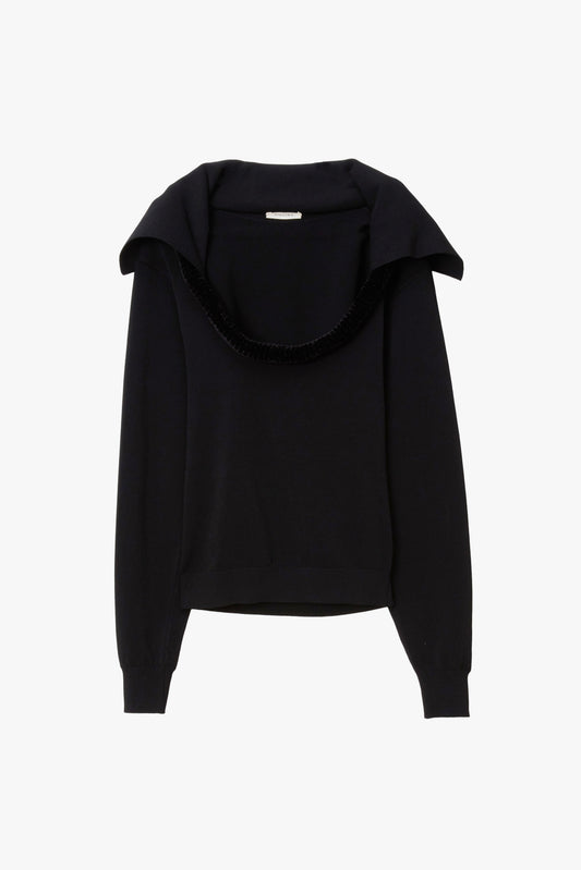 A black long-sleeve knit top with a wide draped collar and a dark velvet-trimmed scoop neckline, shown against a plain white background.