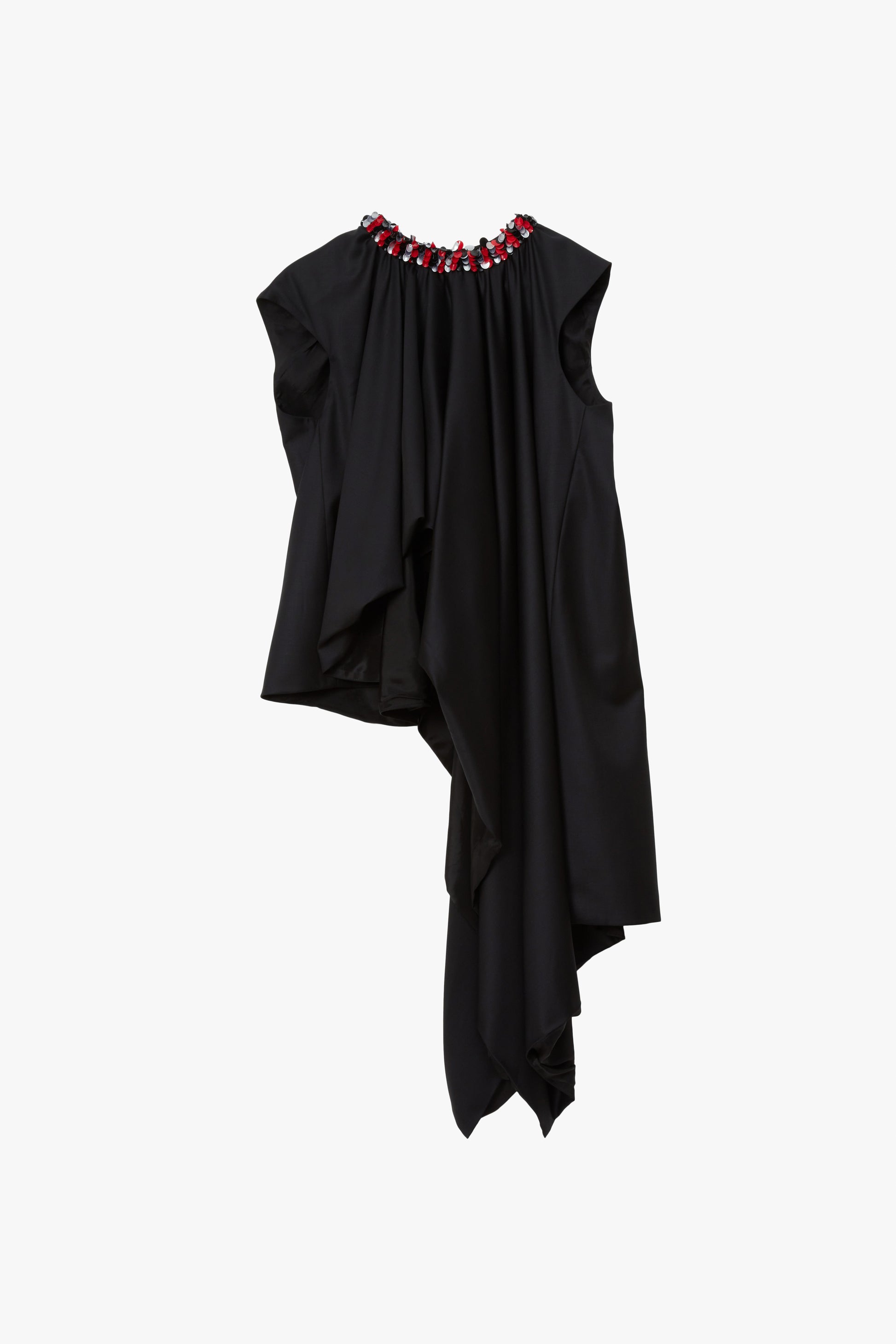 Asymmetrical black sleeveless top with extra draping on the wearer's front left side with red and silver paillettes along the neckline.