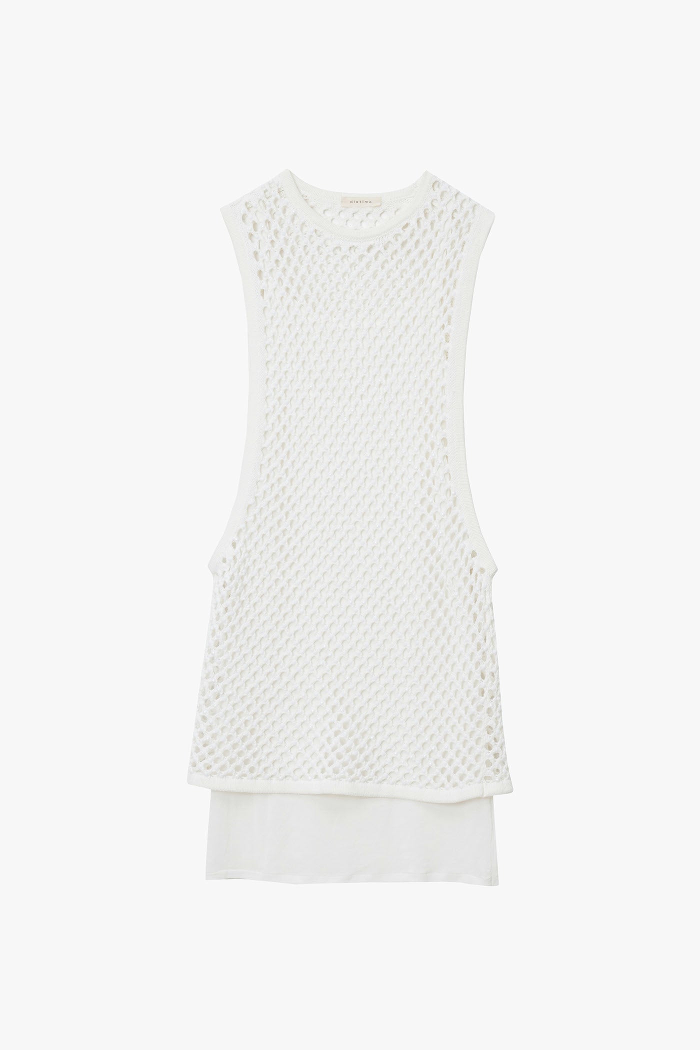 White micro crystal embellished sleeveless mini-dress with wide open sides photographed on a white background. Dress comes with matching knit slip.