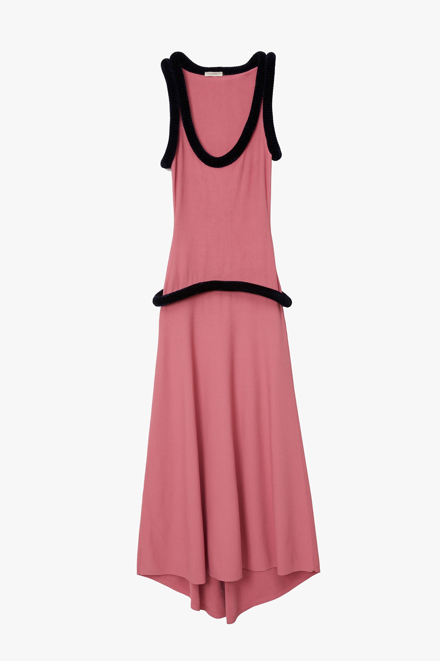 Pink flat knit tank dress with marine blue sculptural tubing at sleeve and neck holes as well as along the hips. Photographed on a white background. 