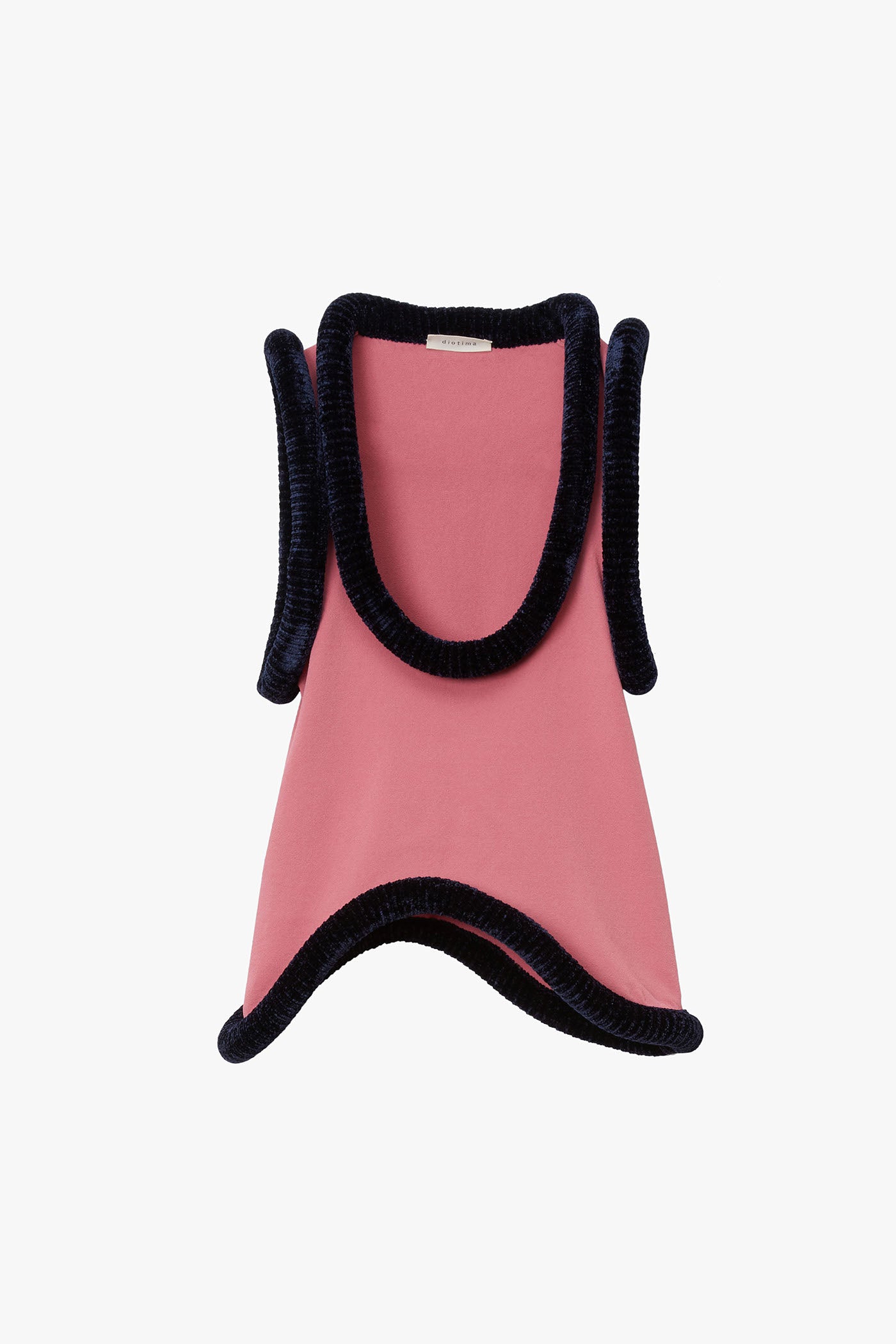 Pink flat knit tank top with marine blue sculptural tubing at hem photographed on a white background. Tank has scooped "U" shaped neckline and wavy bottom hem. 