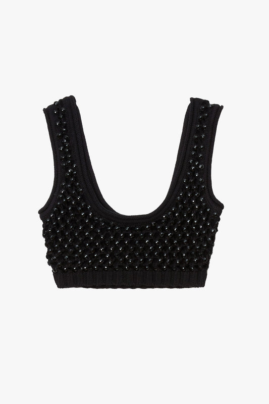 Black knitted chunky crystal embellished bralette on a white background. 
