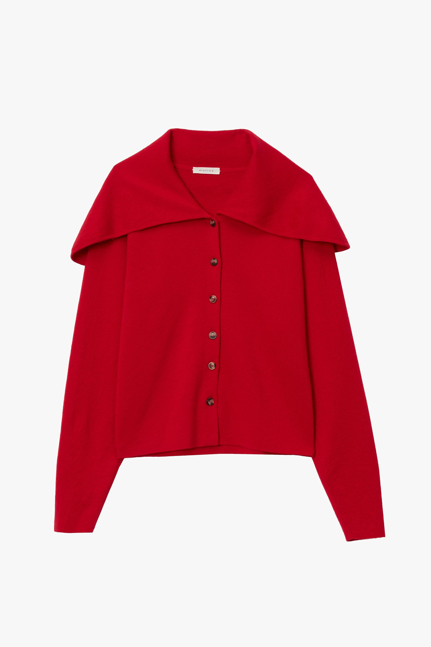 Red cashmere cardigan with crewneck and exaggerated sailors collar photographed on a white background. 