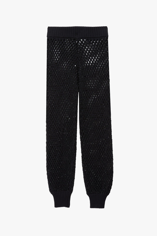 Black micro crystal embellished joggers on a white background.