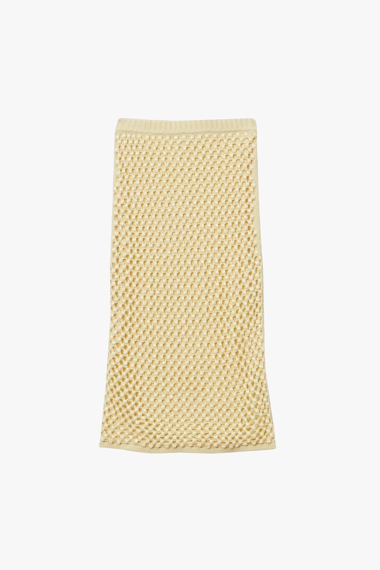 Yellow knit straight skirt with slip and crystal embroidery on a white background