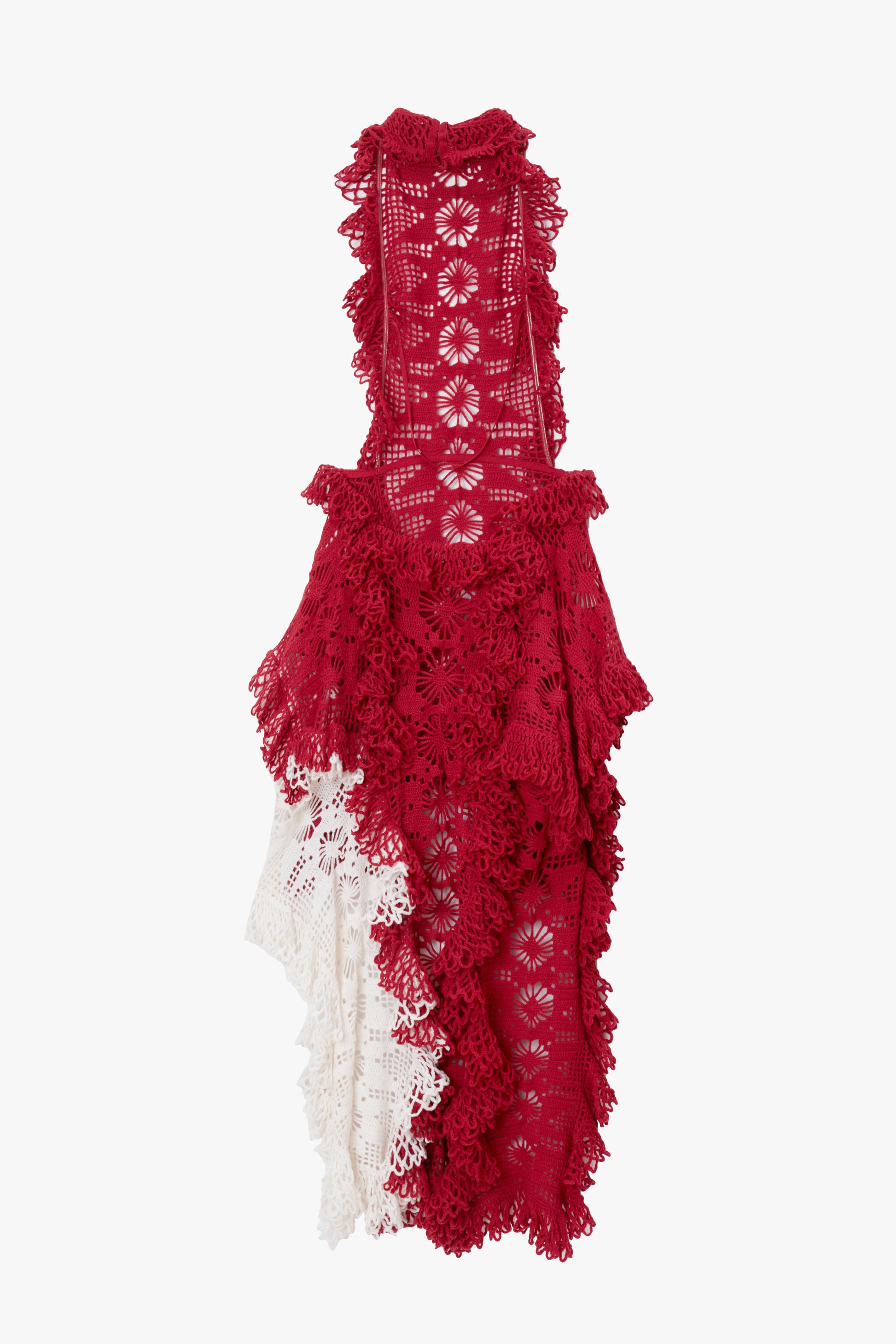 Red and white crochet lace dress with floral patterns on a white background
