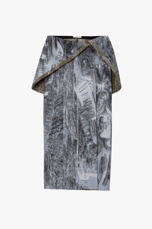 A long draped skirt with a multi-color print. Shown against a white background.