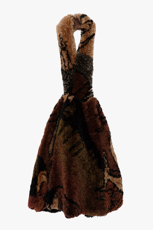 A brown and beige printed organza dress with a halter neckline, photographed against a plain white background.
