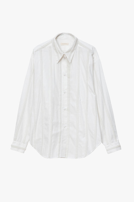 A white long-sleeve button-up shirt with a vertical striped pattern shown flat against a plain white background.