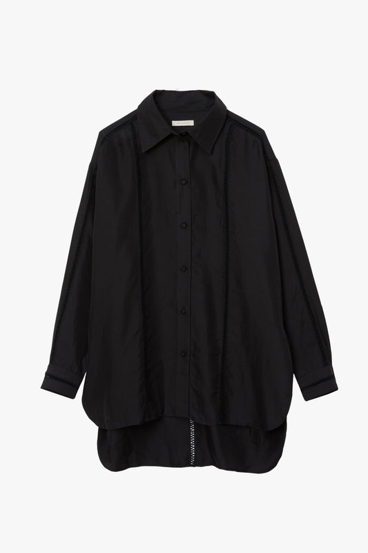 Black button up long sleeve shirt with a pointed collar and vertical stitching in a stripe pattern.