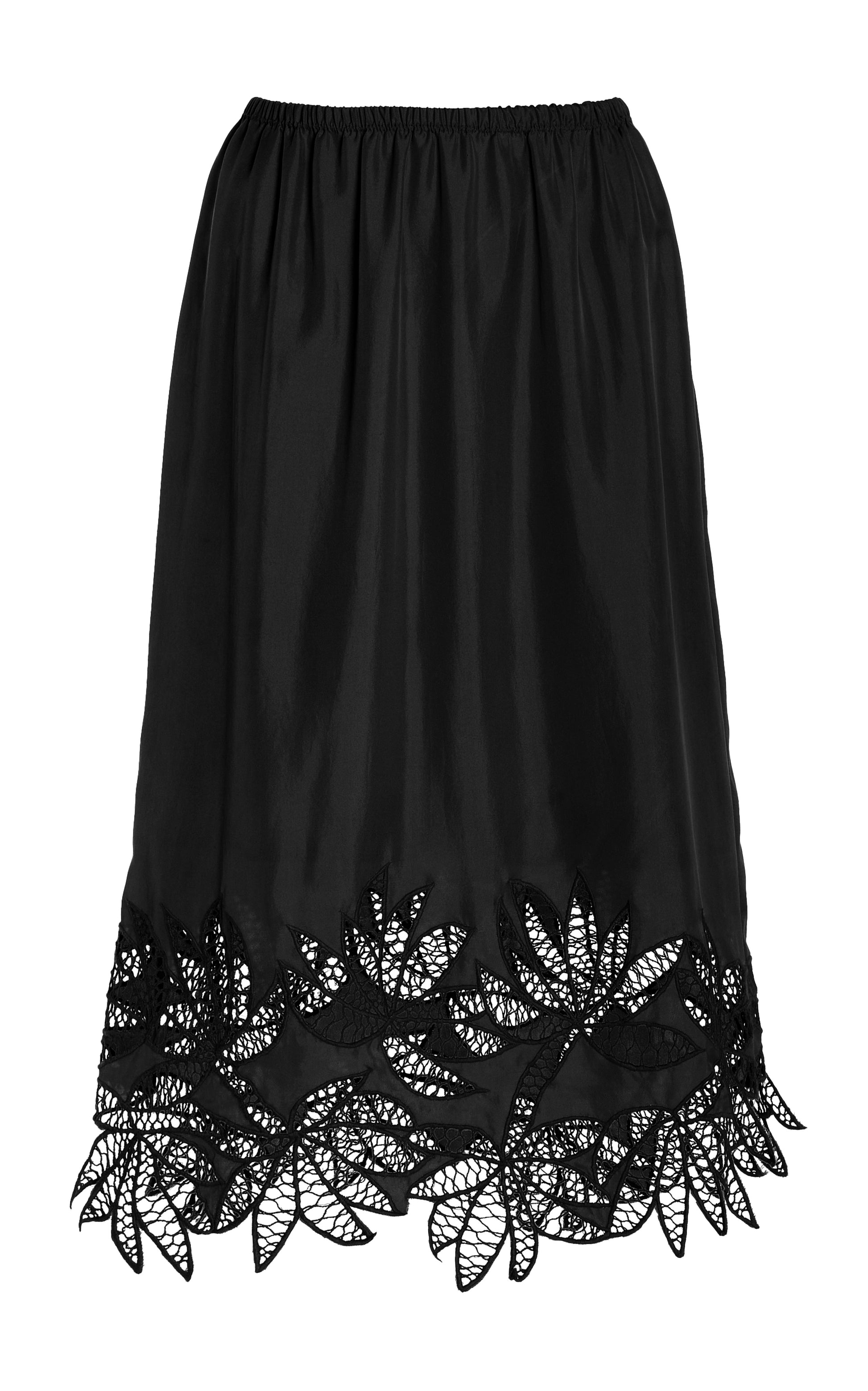 Black silk skirt with flower lace trim on a white background