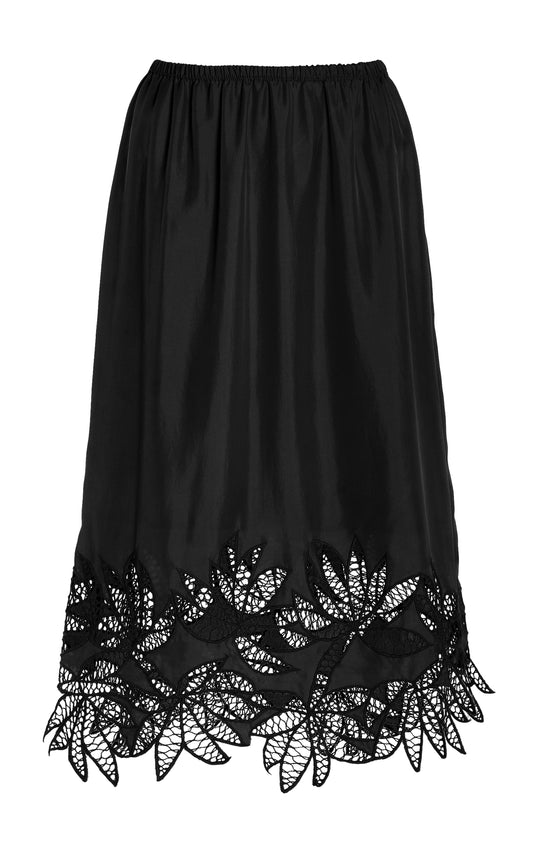 Black silk skirt with flower lace trim on a white background