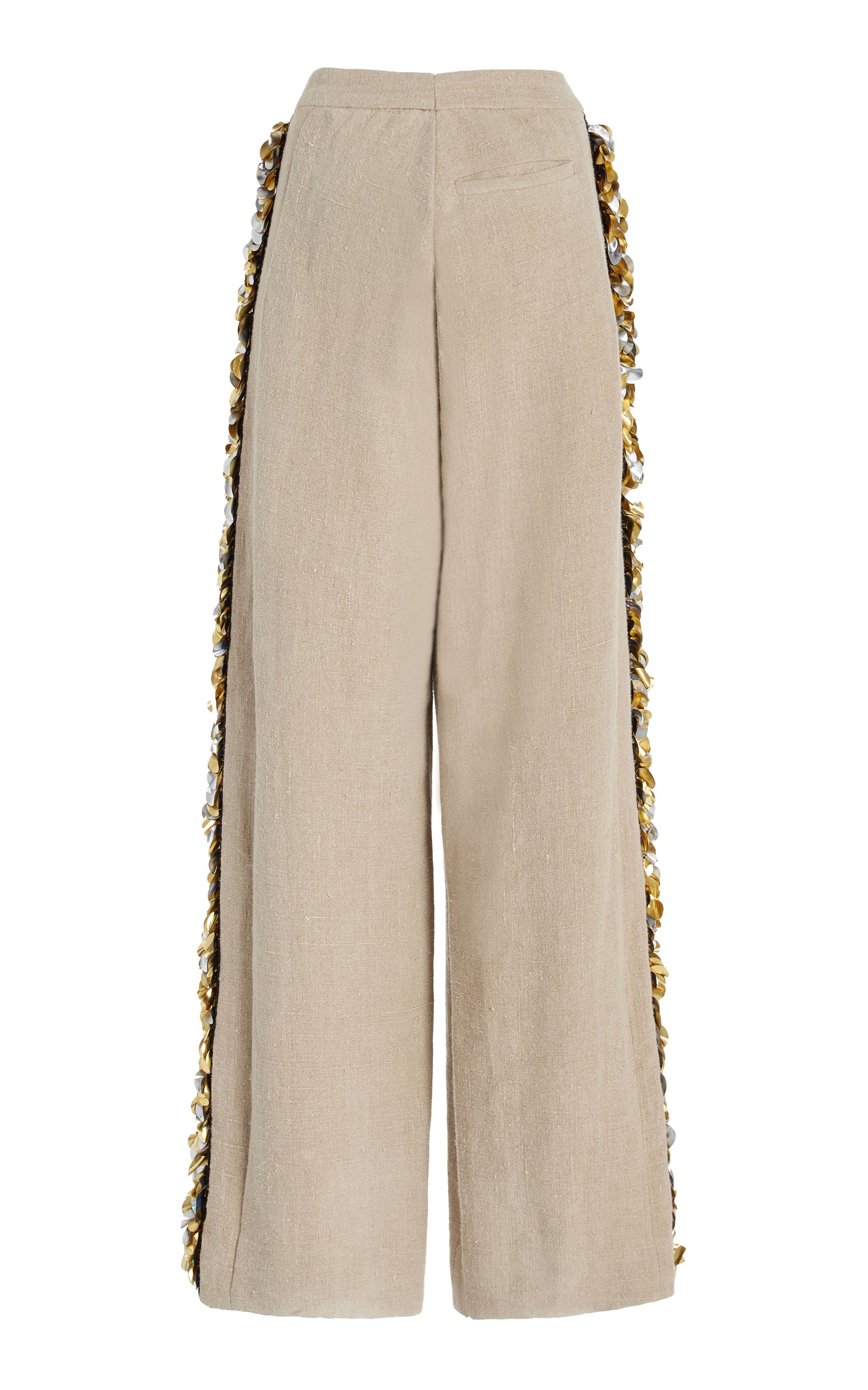 Beige pants with decorative side silver and gold palette trim on a white background
