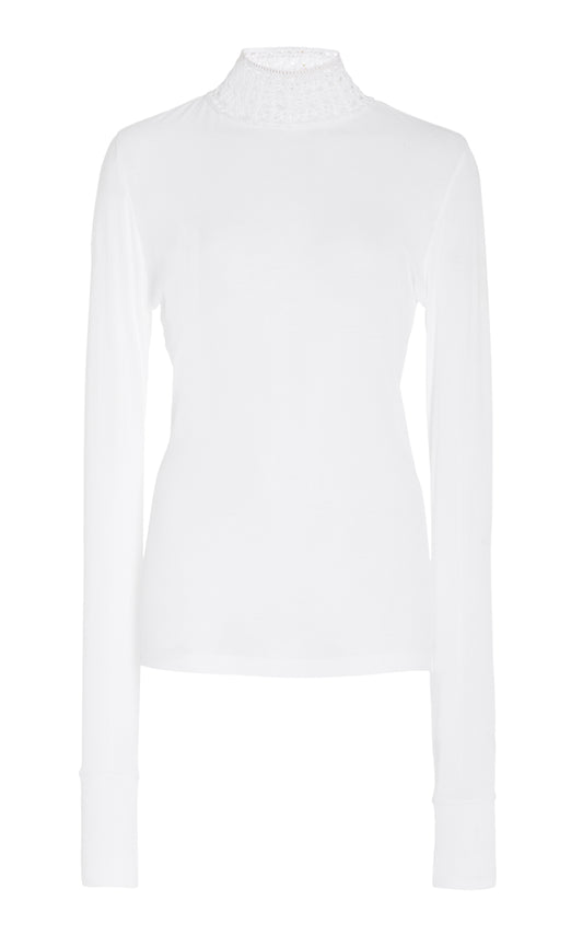 White turtleneck sweater with crochet neck on a white background