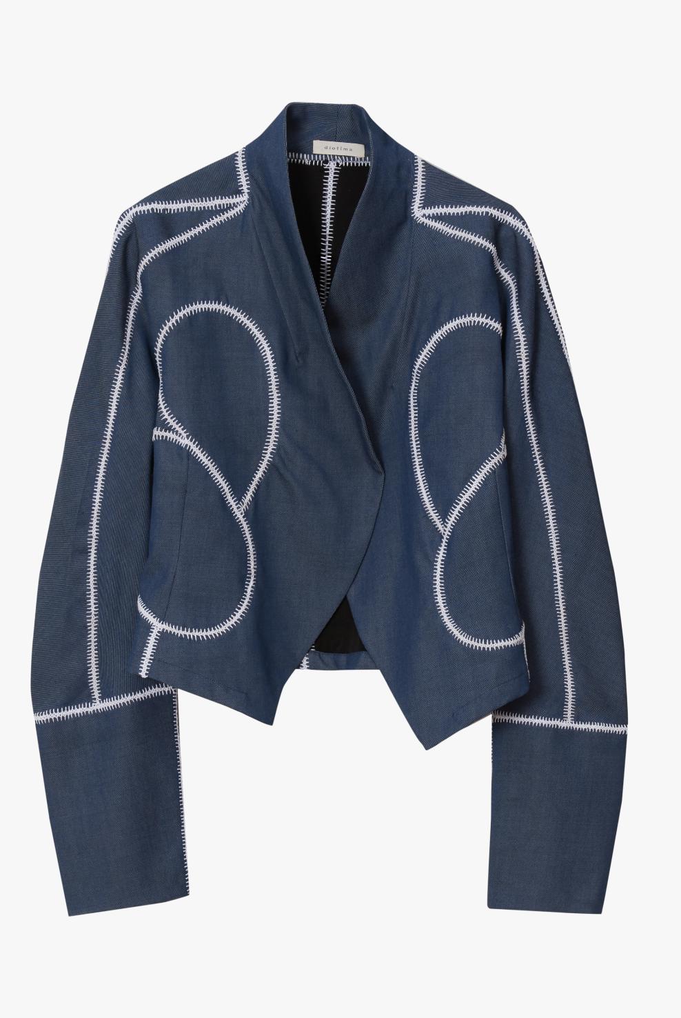 A blue cropped jacket with white contrast stitching forming abstract line patterns, displayed against a white background.