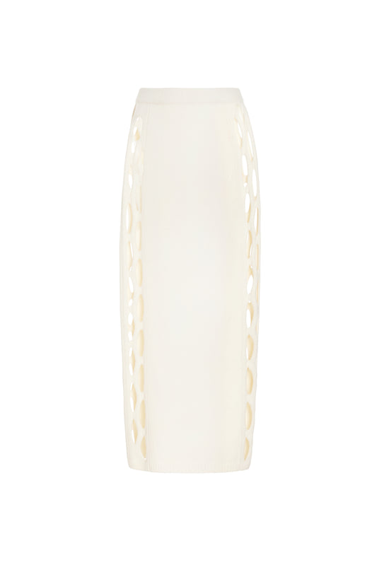 White knit skirt with circular cutouts along both sides photographed against a white background 